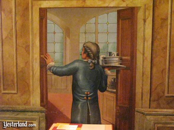 Photo of trompe lil mural of waiter carrying dishes in Alfredos