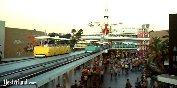 Photo of PeopleMover passing the murals