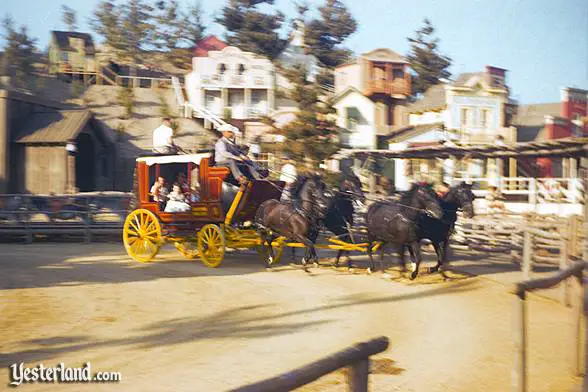 Four horses pulling the Stagecoach Ride into Rainbow Ridge